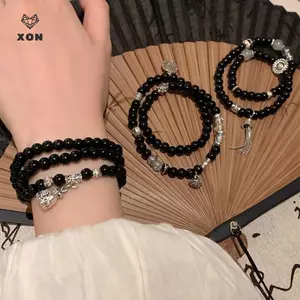 Vòng tay đính cườm phong cách Trung Quốc, sang trọng và cổ điển, phù hợp làm quà tặng.