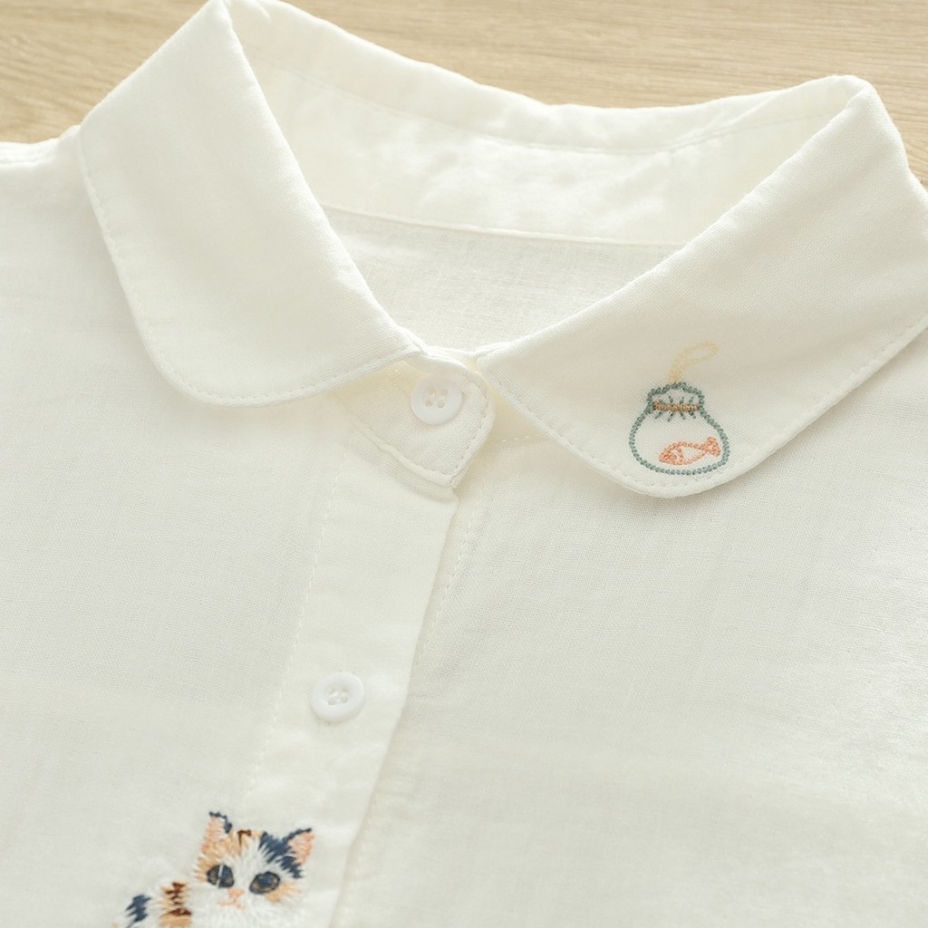<![CDATA[Áo sơ mi nữ 100% sợi cotton cao cấp, hoạ tiết thêu hoạt hình mèo trắng]]>