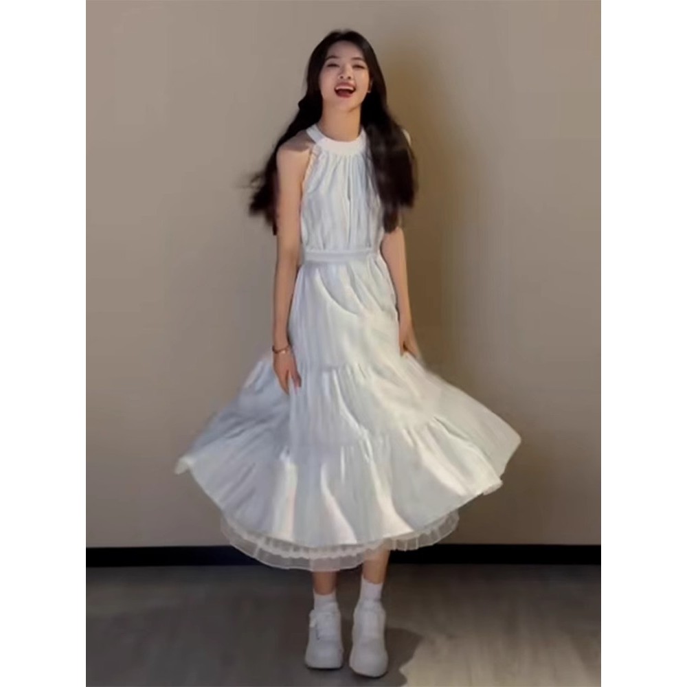 Đầm dây nữ mùa hè phong cách mới, thích hợp đi biển với màu sắc tươi sáng và thiết kế cổ điển.