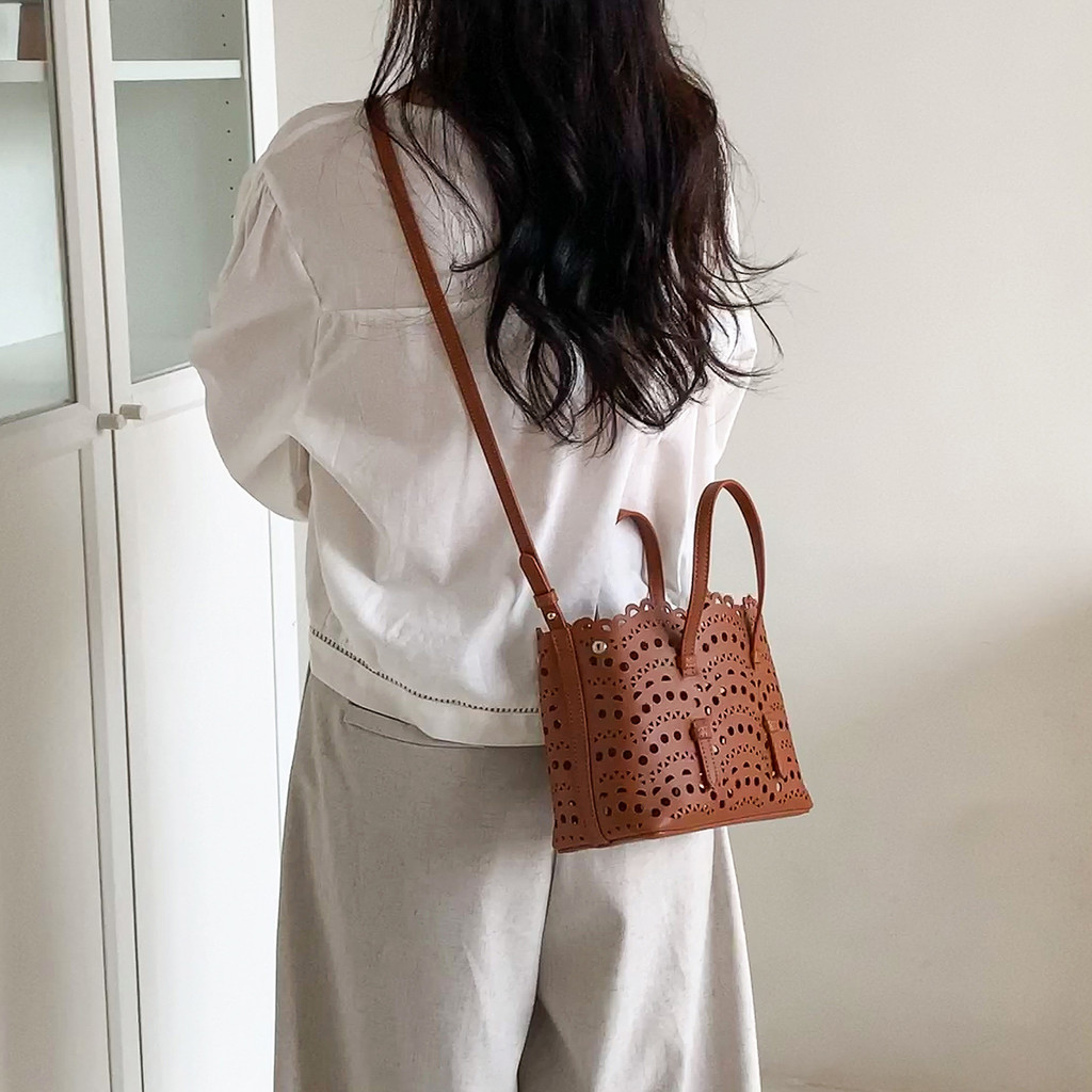 ANCO Phong Cách Hàn Quốc Khắc Rỗng Túi Đựng Rau Cao Cấp 2026 Phong Cách Mới Nữ Thời Trang Đi Lại Di Động Đeo Ngang