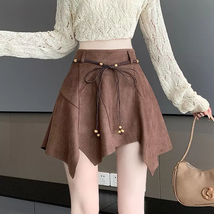 Váy da lộn vintage không đều mùa thu đông mới, váy A-line cao cấp, ôm sát, sexy, đa năng, váy ngắn