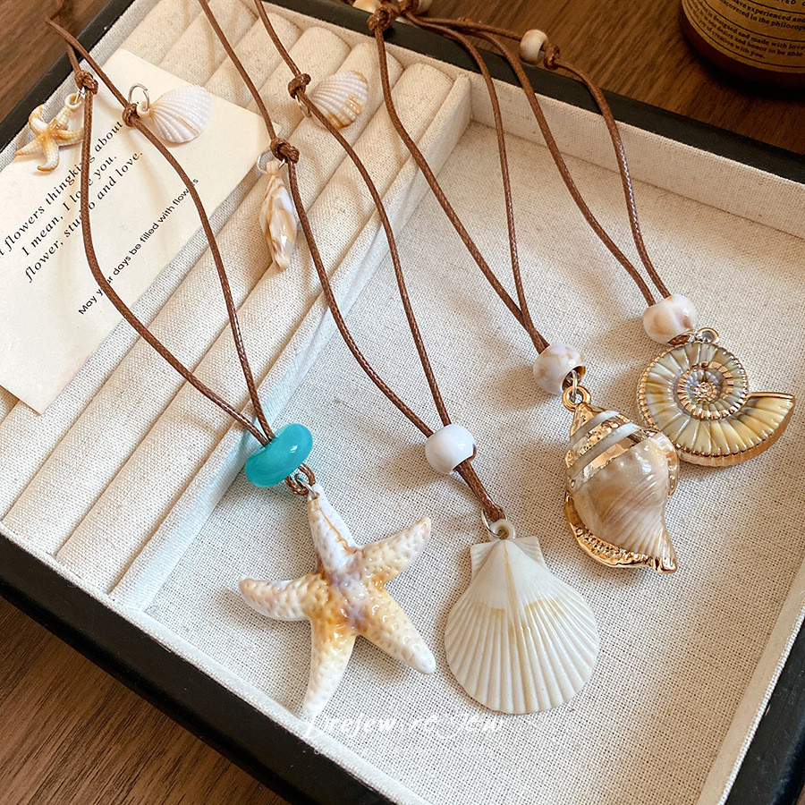 DREJEW Vòng cổ Lariat có thể điều chỉnh phong cách bãi biển đại dương dành cho nữ - Vòng cổ dây sáp vỏ sò hình sao biển, Trang sức kỳ nghỉ mùa hè Bohemian để mặc hàng ngày & du lịch
