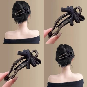 Kẹp tóc phong cách Hàn Quốc với nơ mỏ vịt lấp lánh pha lê, phù hợp tạo kiểu updo thanh lịch.