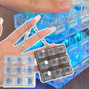 2 Móc khóa bàn phím chín nút có pin tích hợp, Đồ chơi giảm căng thẳng bằng nhựa cao cấp, 2 kiểu: Mờ / Dạ quang, Đen trong suốt / Màu trong suốt