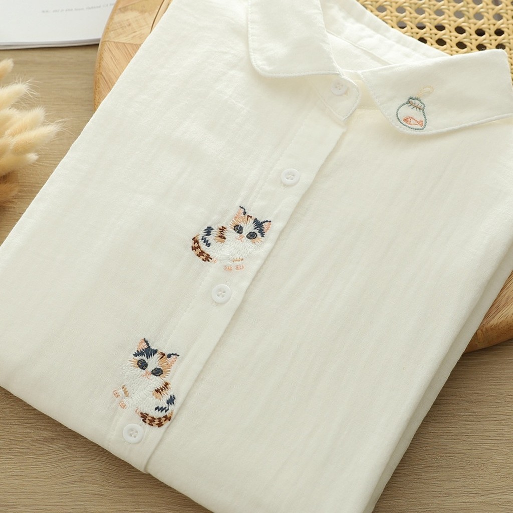 <![CDATA[Áo sơ mi nữ 100% sợi cotton cao cấp, hoạ tiết thêu hoạt hình mèo trắng]]>
