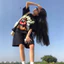 Bộ đồ hai mảnh gồm quần short và áo thun thể thao, in hình hoạt hình