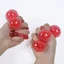 Đồ chơi bóp giác quan căng thẳng Life Like Strawberry với chuyển động hạt dịu nhẹ