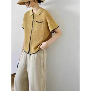 <![CDATA[Áo thun nữ tay ngắn thiết kế cổ polo màu sắc đối lập]]>
