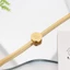 Vòng tay nữ đàn hồi vàng thời trang, thép Titan bền màu, phù hợp nhiều phong cách