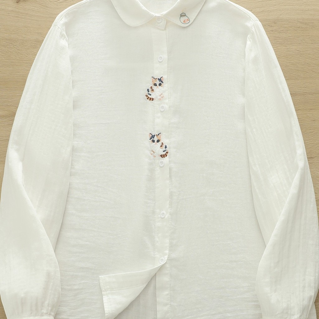 <![CDATA[Áo sơ mi nữ 100% sợi cotton cao cấp, hoạ tiết thêu hoạt hình mèo trắng]]>