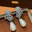 Bông tai tua rua zircon ngọc trai với thiết kế ánh sáng hoa, phong cách sang trọng mới nhất