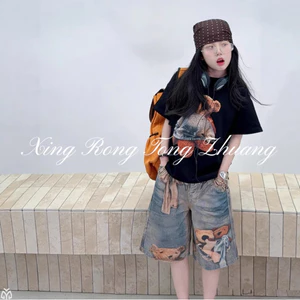 Quần giữa Denim bé gái mùa hè 2026 Phong cách mới cho trẻ em Quần short in hình gấu kỹ thuật số
