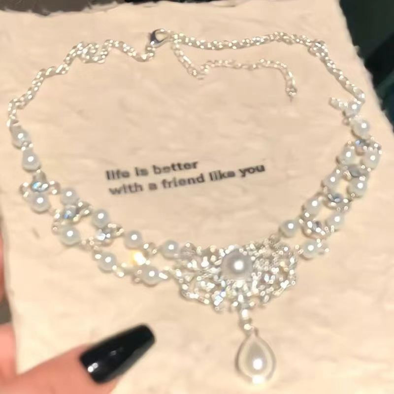 Nhẹ nhàng chuỗi xương đòn zircon và ngọc trai hai lớp tua rua, ánh sáng nhấp nháy, phong cách mới sang trọng