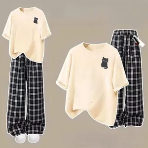 Trang phục nữ dáng dài kẻ caro đen họa tiết cú - thoitrangthubio, phong cách thời trang ấn tượng