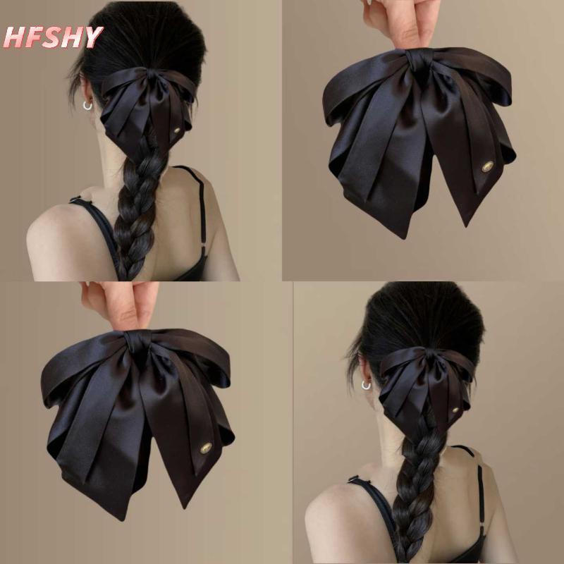 Kẹp tóc satin nơ đuôi ngựa sang trọng, phù hợp cho nữ và cô gái với thiết kế tinh tế.