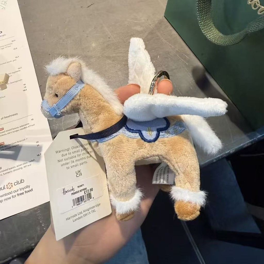 Mặt dây chuyền búp bê Harold Angel Pony sang trọng – Quà tặngperfect cho tín đồ du lịch