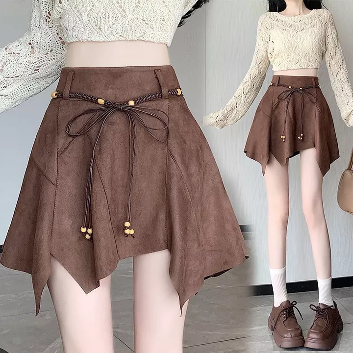 Váy da lộn vintage không đều mùa thu đông mới, váy A-line cao cấp, ôm sát, sexy, đa năng, váy ngắn