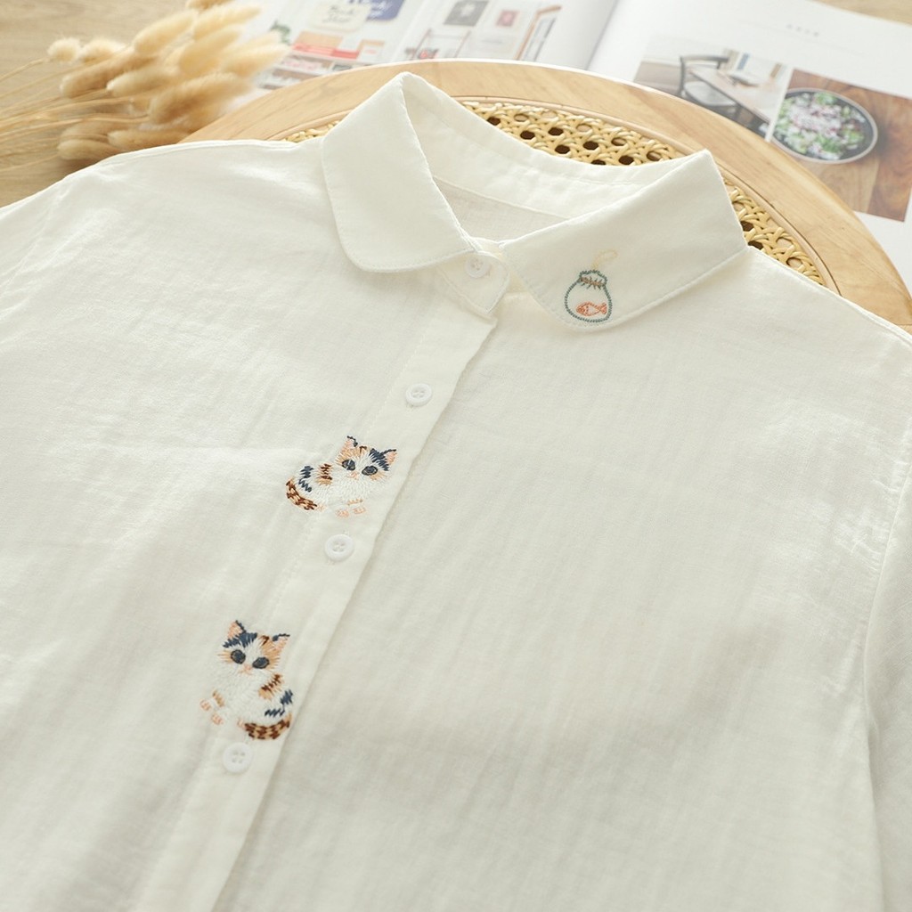 <![CDATA[Áo sơ mi nữ 100% sợi cotton cao cấp, hoạ tiết thêu hoạt hình mèo trắng]]>