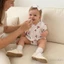 Trang phục bé gái Áo liền quần cổ tròn ngắn tay in hình anh đào ngọt ngào và băng đô