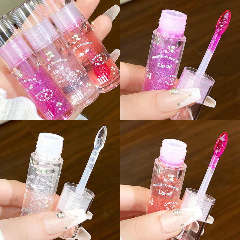 Xixi Dầu Môi Dưỡng Ẩm Water Glossy Nhẹ,Tự Nhiên Dễ Thoa Màu Sắc Sáng Bóng Giá Rẻ Cho Sinh Viên D748