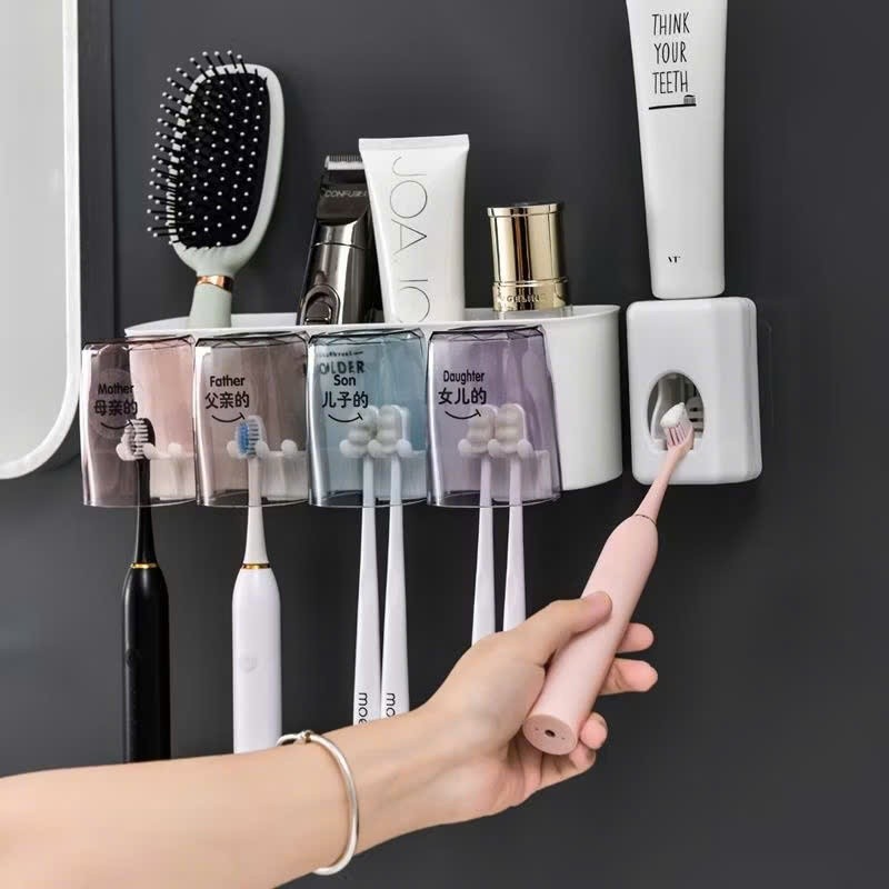Kệ để bàn chải nhả kem tự động dán tường kèm 4 cốc treo đồ