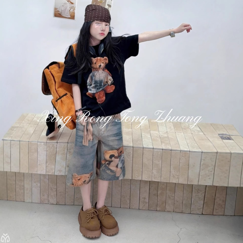 Quần giữa Denim bé gái mùa hè 2026 Phong cách mới cho trẻ em Quần short in hình gấu kỹ thuật số