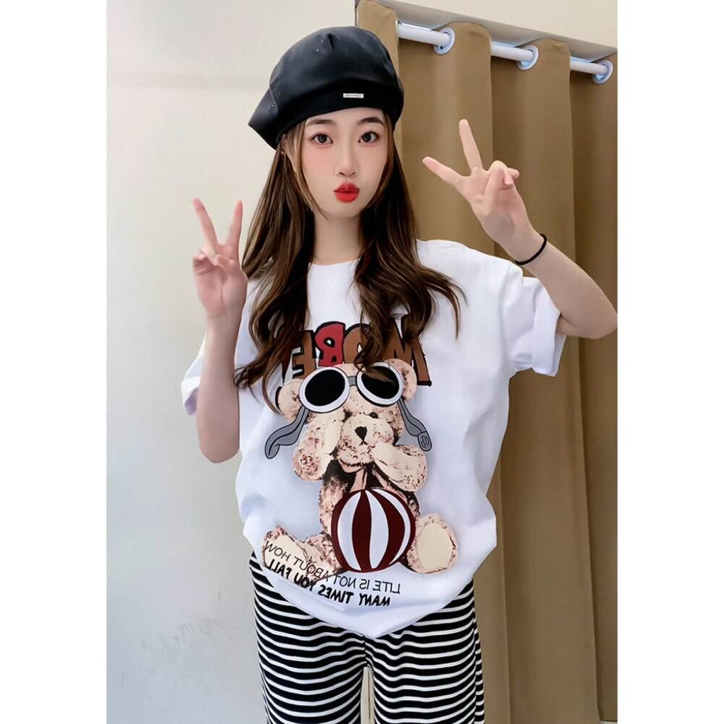 Áo nữ tay ngắn, dáng rộng, cổ tròn, mềm mại và thoáng khí.