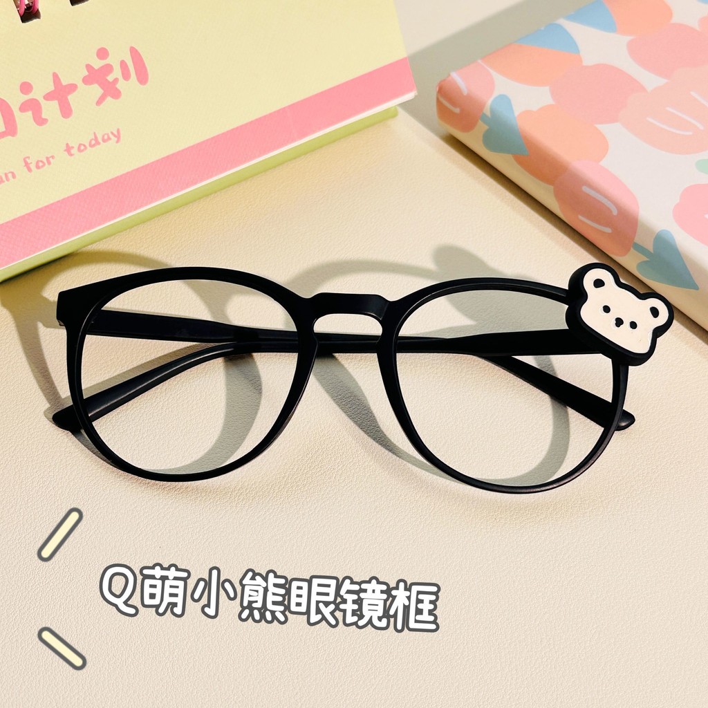 Nơ khung kính màu đen nhìn khung kính nhỏ màu trắng