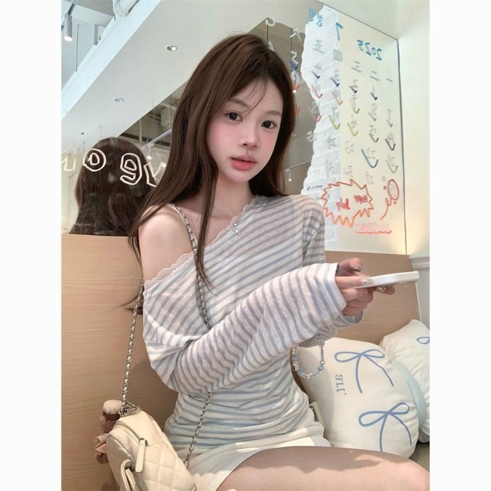 Tinh khiết ham muốn phong cách cổ nghiêng sọc dài tay mùa thu ren nối mỏng lệch vai hàng đầu