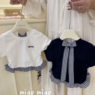 Phong cách Hàn Quốc bé gái mùa hè ren nối áo bé gái nơ sau lưng áo thun ngắn tay nguyên chất cotton