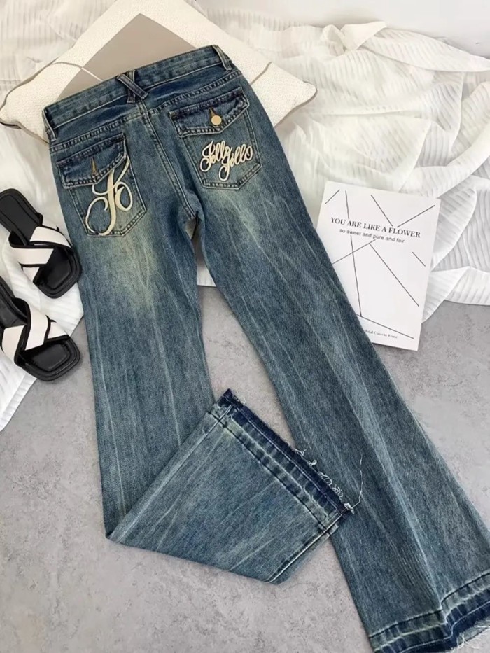 Quần jeans ống loe thêu cạp cao