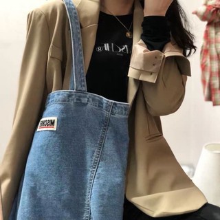 Túi denim thiết kế thích hợp nhẹ nhàng và lười biếng Túi đeo vai đa năng mới 2026 Túi vải canvas sứ