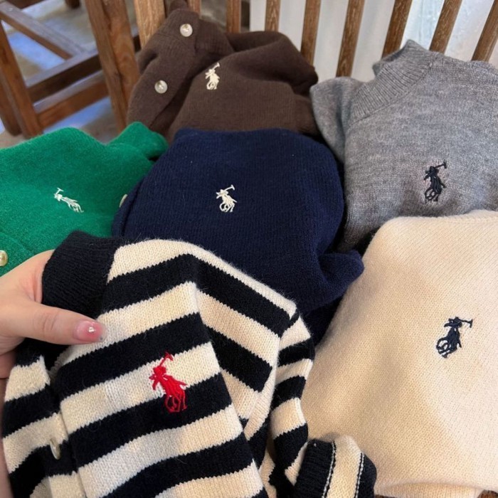 Áo len trẻ em mùa thu mới màu trơn thêu dệt kim cardigan cho bé trai và bé gái áo khoác len n