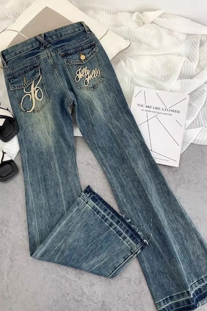Quần jeans ống loe thêu cạp cao