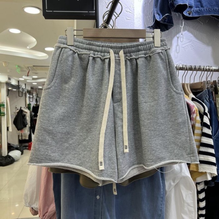 Lưng thun dây rút dáng rộng quần short ống rộng nữ mùa hè thời trang mới phong cách thể thao