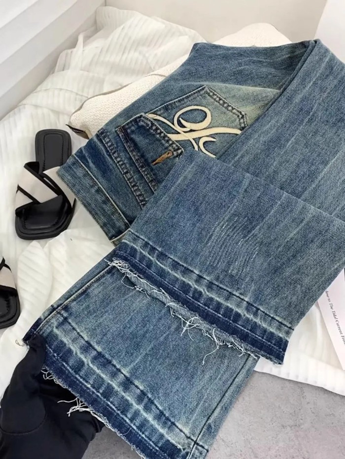 Quần jeans ống loe thêu cạp cao
