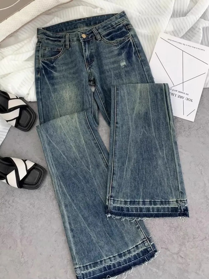 Quần jeans ống loe thêu cạp cao
