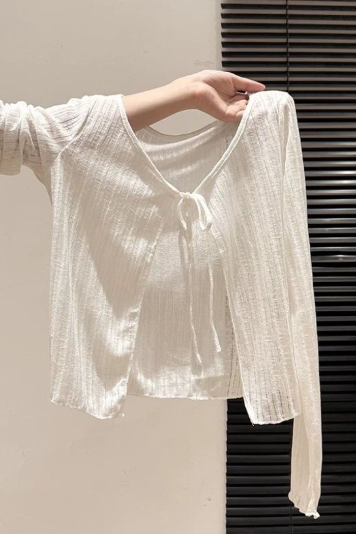 dây ngoài mỏng hơi xuyên thấu màu trắng chống nắng áo khoác cardigan nữ áo thun dài tay hàng