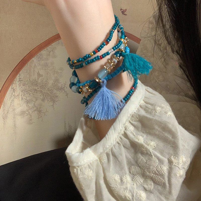 Vòng tay đính cườm nhiều lớp phong cách Bohemian cho bé gái