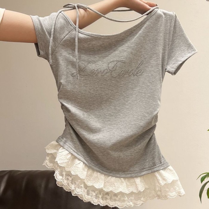 chiếc áo thun ren ngắn tay in chữ cỡ vừa và lớn cho trẻ em mùa hè giảm béo kiểu mới ruy băng kiể