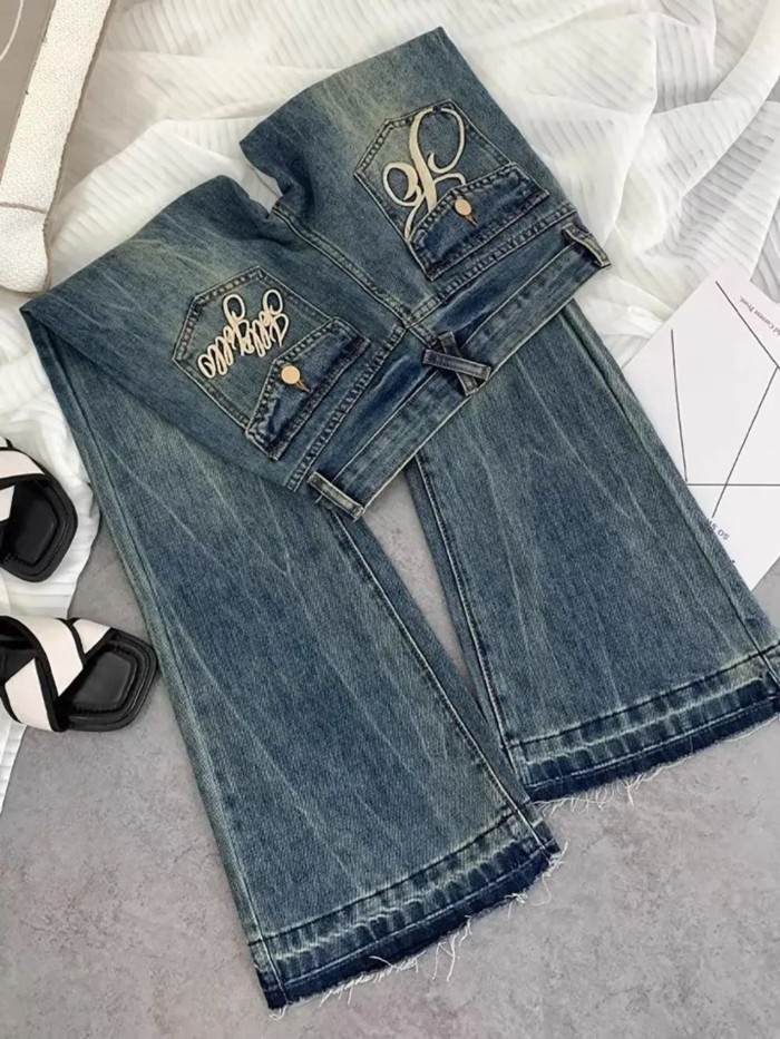 Quần jeans ống loe thêu cạp cao