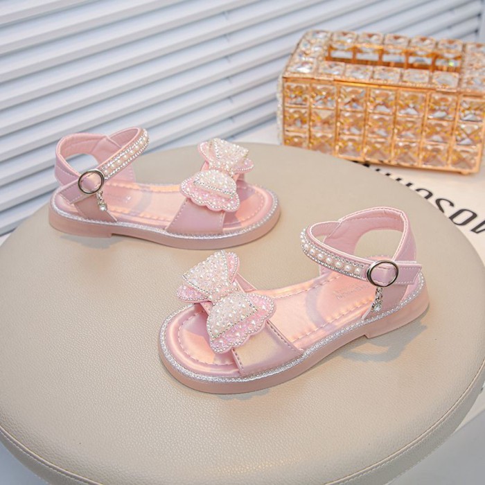 Giày Sandal Đế Mềm Nơ Pha Lê Giày Bé Gái Ngọc Trai Giày Công Chúa Giày Đi Biển Hợp Thời Trang