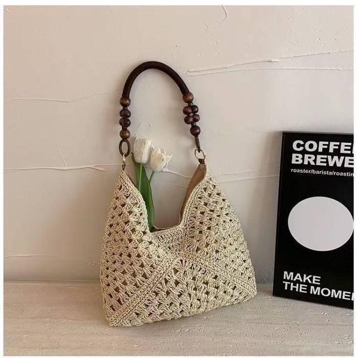 Túi dệt rỗng mùa hè mới bằng rơm dệt đi nghỉ mát bên bờ biển Túi tote đeo vai đơn đi biển Túi