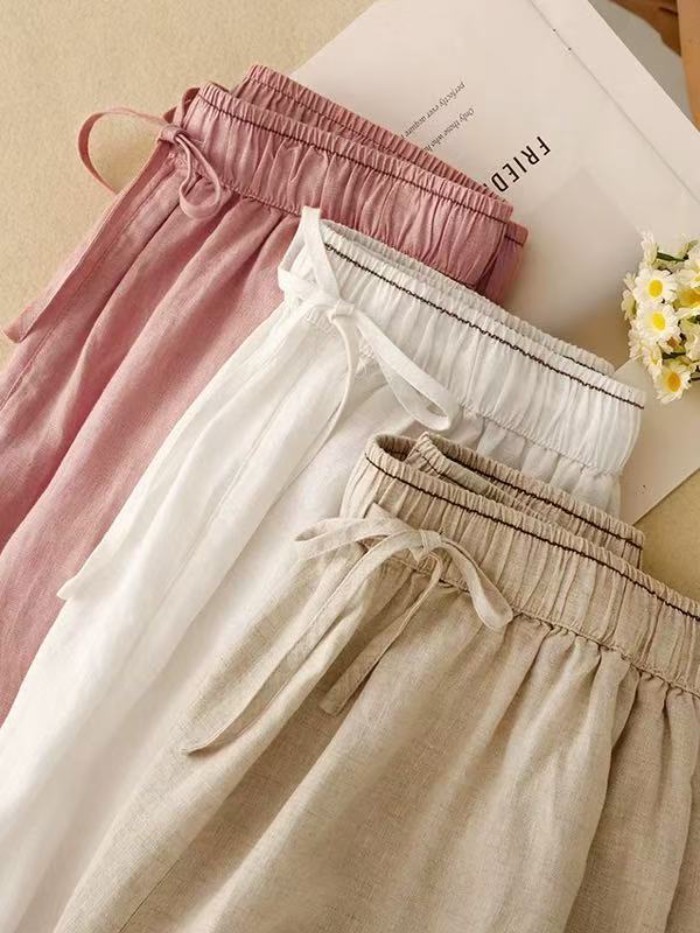 quần âu phong cách mùa hè mới dành cho nữ, nghệ thuật retro thêu màu trơn lưng thun rời quần chí