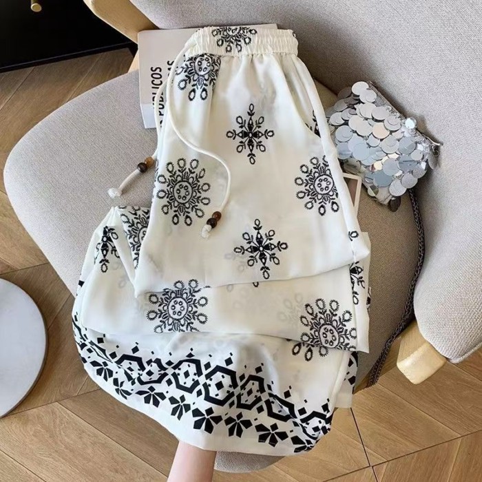 dáng rộng kích thước lớn ngày lễ phong cách dân tộc hoa quần ống rộng cho nữ mùa hè mỏng thun mỏ