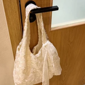 Áo vest một vai ren hoa tươi mới của Hàn Quốc mới có sức chứa lớn Túi vải tote nách