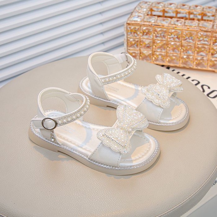 Giày Sandal Đế Mềm Nơ Pha Lê Giày Bé Gái Ngọc Trai Giày Công Chúa Giày Đi Biển Hợp Thời Trang