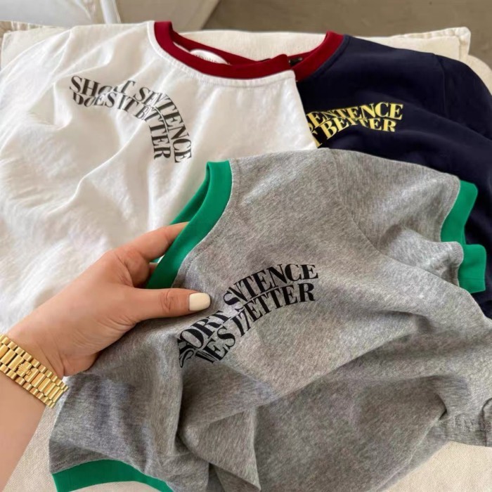 Trẻ em bé gái ngắn tay mùa hè bé trai cổ tròn chữ cái cotton sành điệu Áo thun trẻ em màu sắc