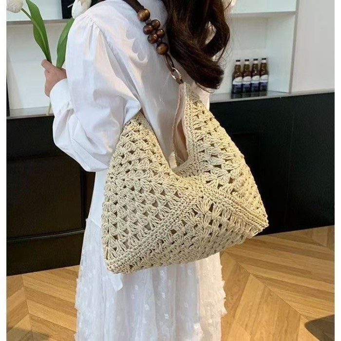 Túi dệt rỗng mùa hè mới bằng rơm dệt đi nghỉ mát bên bờ biển Túi tote đeo vai đơn đi biển Túi