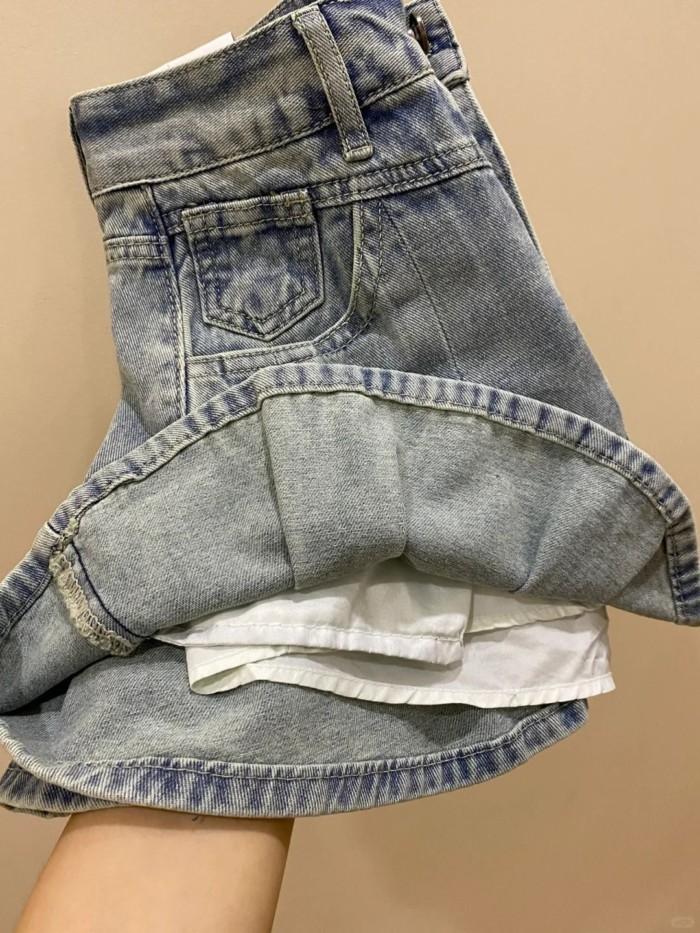 Váy denim cổ điển cỡ lớn mùa hè mới chống lộ thiết kế eo cao váy xếp ly giảm béo